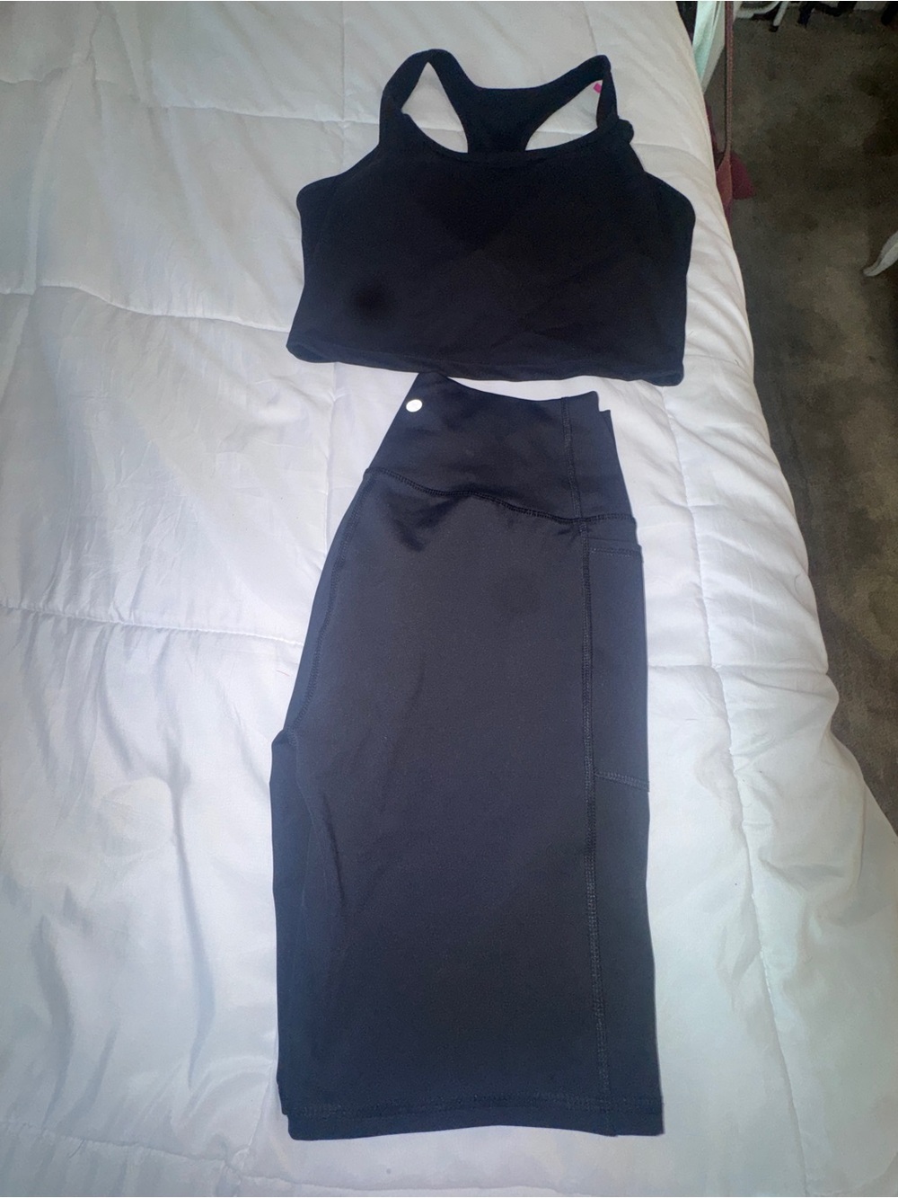 Black and Royal blue 2 sets of Women's Athletic Bike Shorts and razor back top.